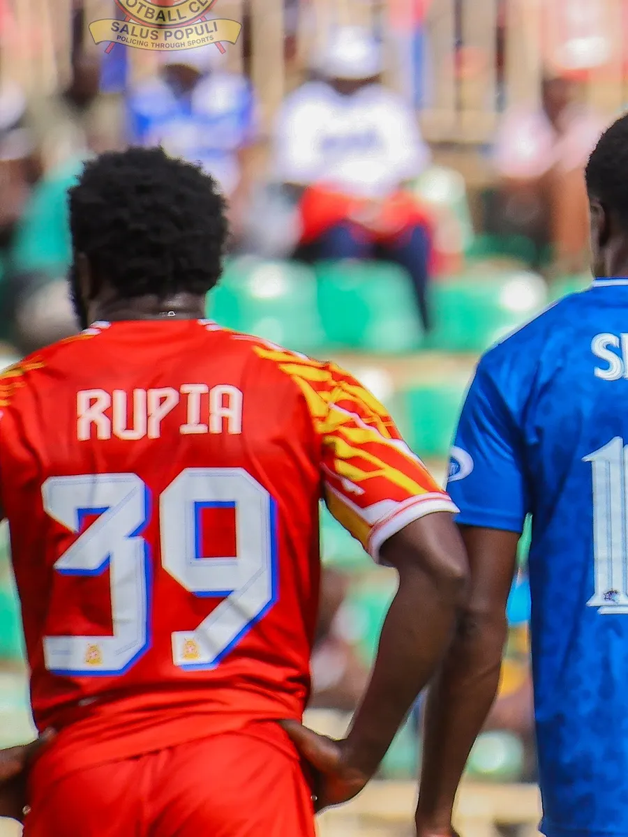 Elvis Rupia, number 39, seen from behind on the pitch
